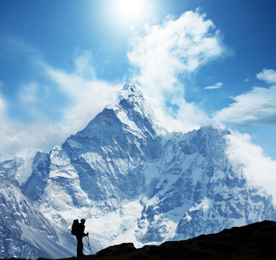 Hiking Vacations: Snow covered peak on a hike in the Himalaya mountains.