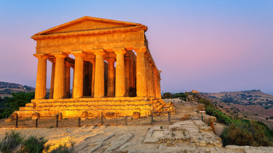 Antique greek temple of Concordia in the Valley of Temples, Agrigento, Sicily, Italy, on sunset